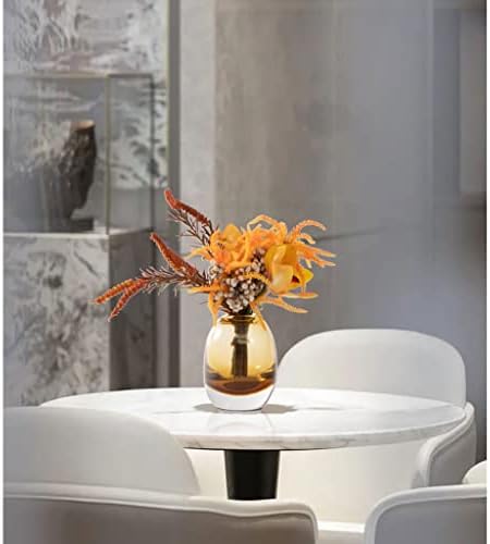 Elegant Artificial Flowers in Glass Vase