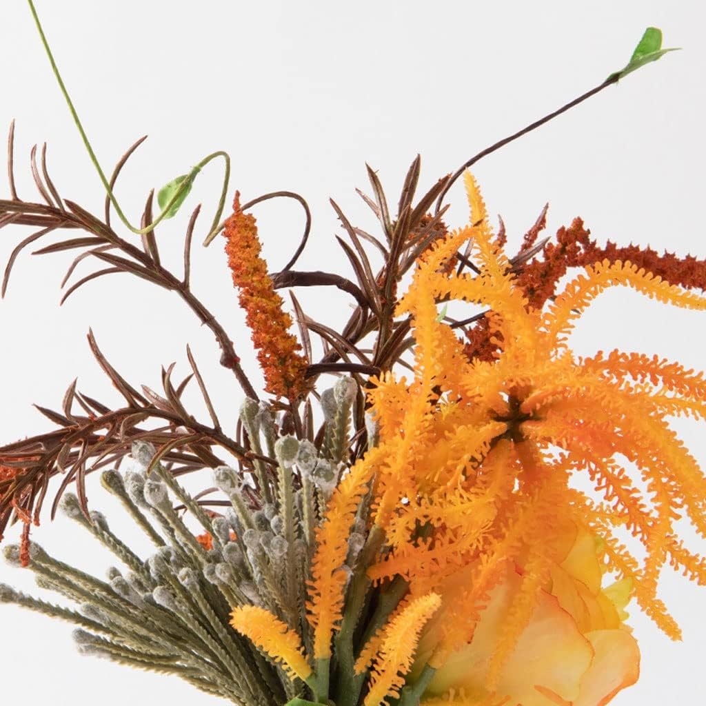 Elegant Artificial Flowers in Glass Vase